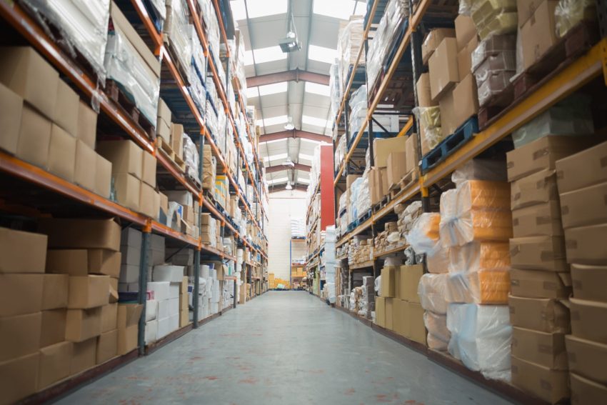 Shelves with boxes in warehouse